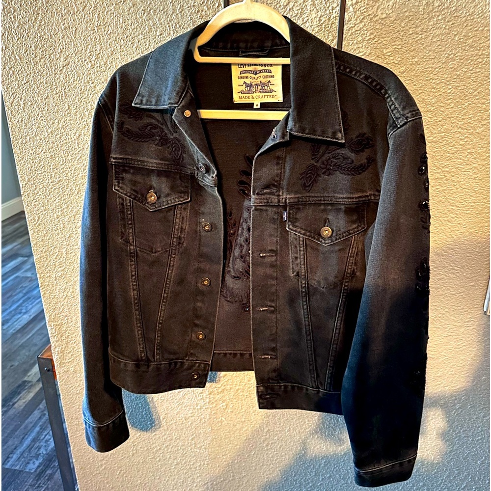 Like “new”, LEVI black denim jacket, medium women’s with eyelet cutouts